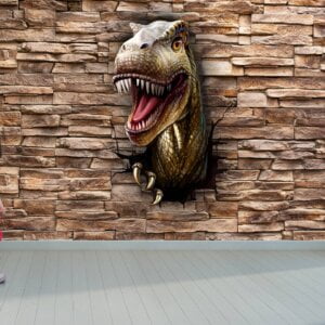Fearsome T-Rex emerging from a solid brick wall in a dramatic display.
