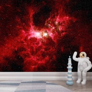 Child looking at Self-Adhesive Red Galaxy Wall Mural in bedroom