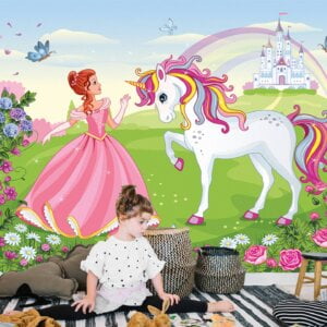 Princess in pink dress standing beside a majestic unicorn in a field.